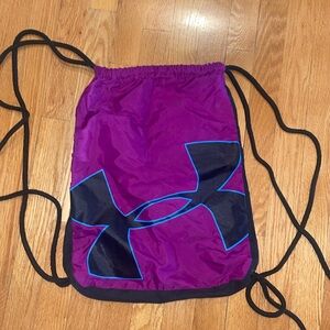 Under armour black and purple drawstring bag